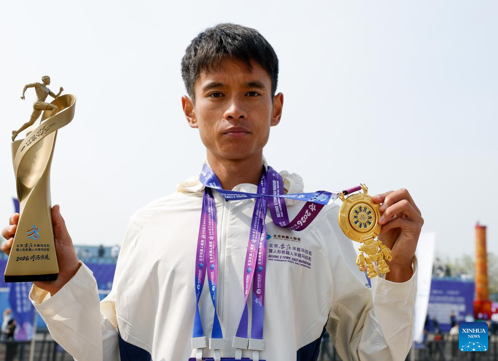 Humanoid robot surpasses human half-marathon world record in Beijing