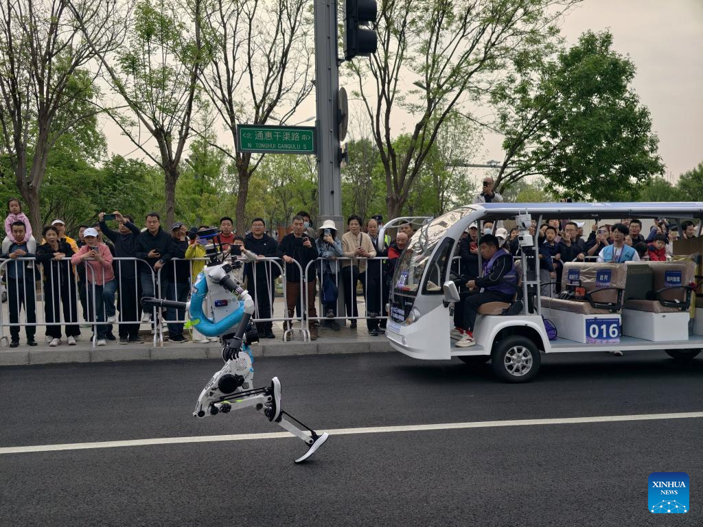 Humanoid robot surpasses human half-marathon world record in Beijing