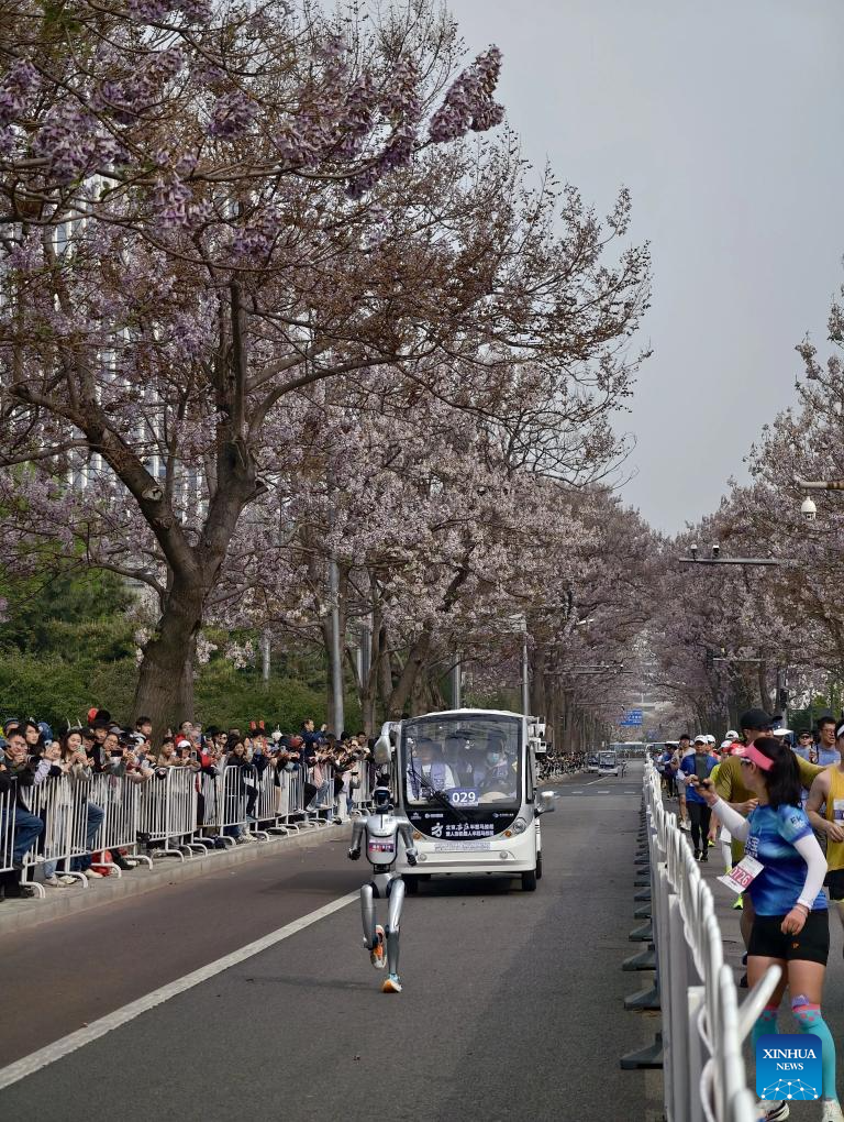 Humanoid robot surpasses human half-marathon world record in Beijing