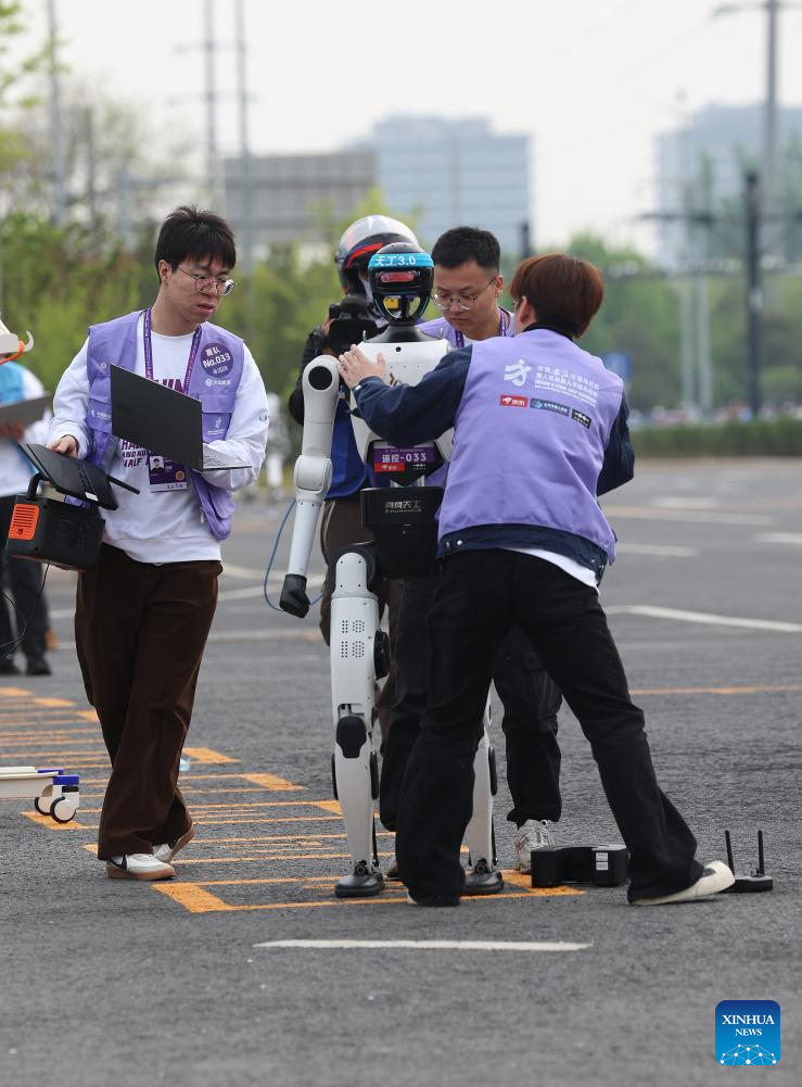 Humanoid robot surpasses human half-marathon world record in Beijing