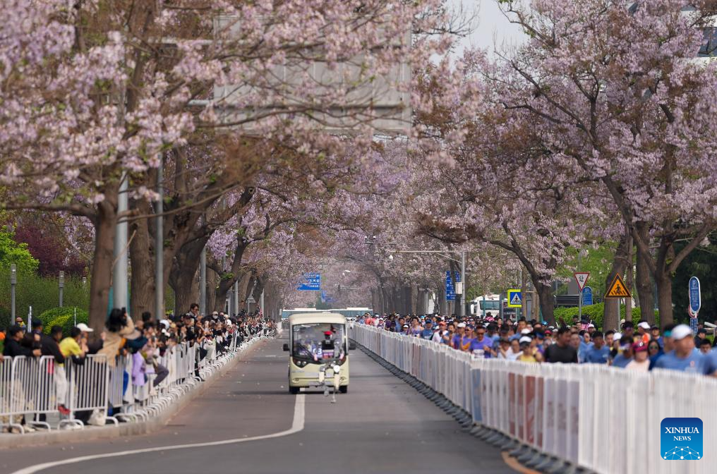 Humanoid robot surpasses human half-marathon world record in Beijing