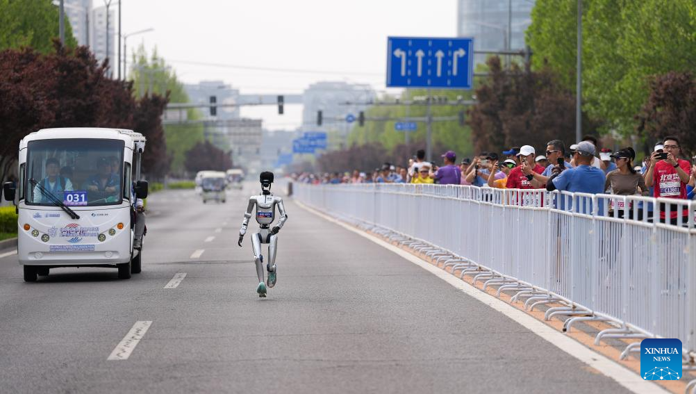 Humanoid robot surpasses human half-marathon world record in Beijing