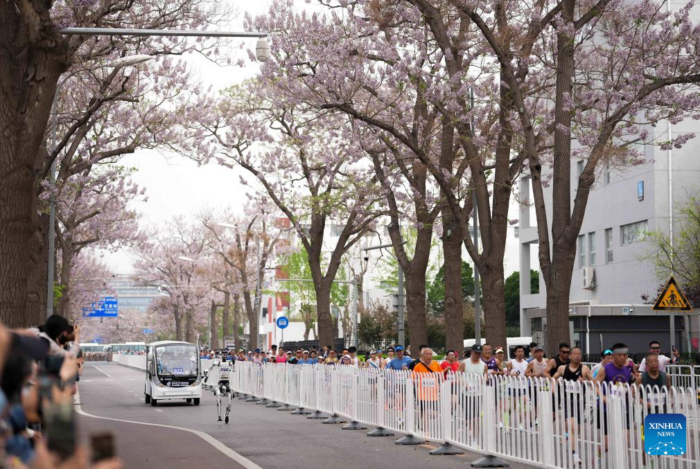Humanoid robot surpasses human half-marathon world record in Beijing