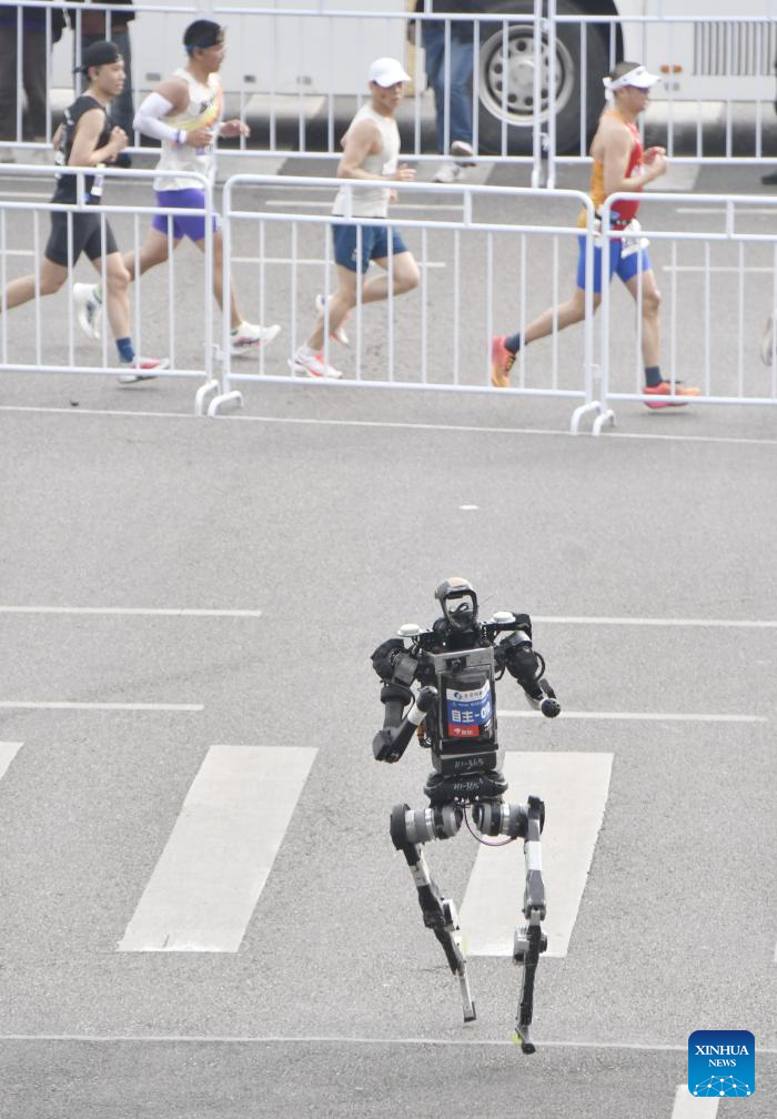 Humanoid robot surpasses human half-marathon world record in Beijing