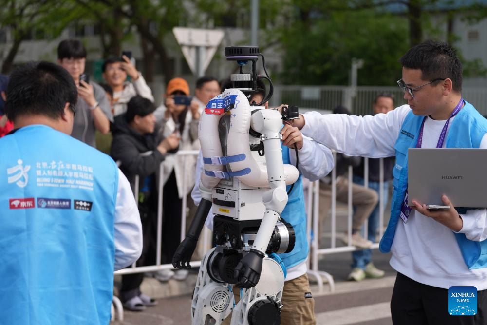 Humanoid robot surpasses human half-marathon world record in Beijing