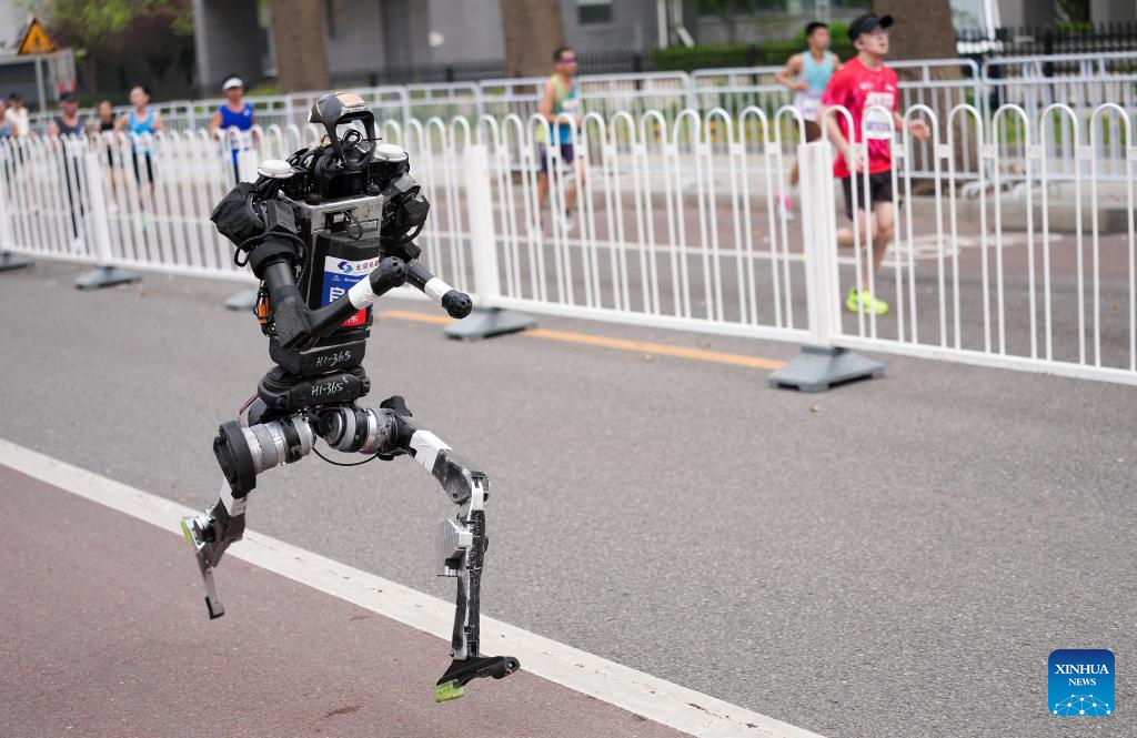 Humanoid robot surpasses human half-marathon world record in Beijing