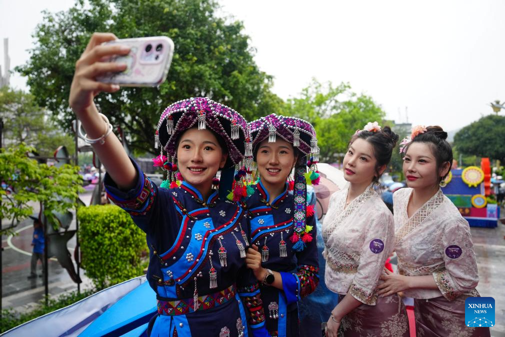 Twin festival lures tourists in SW China's Yunnan