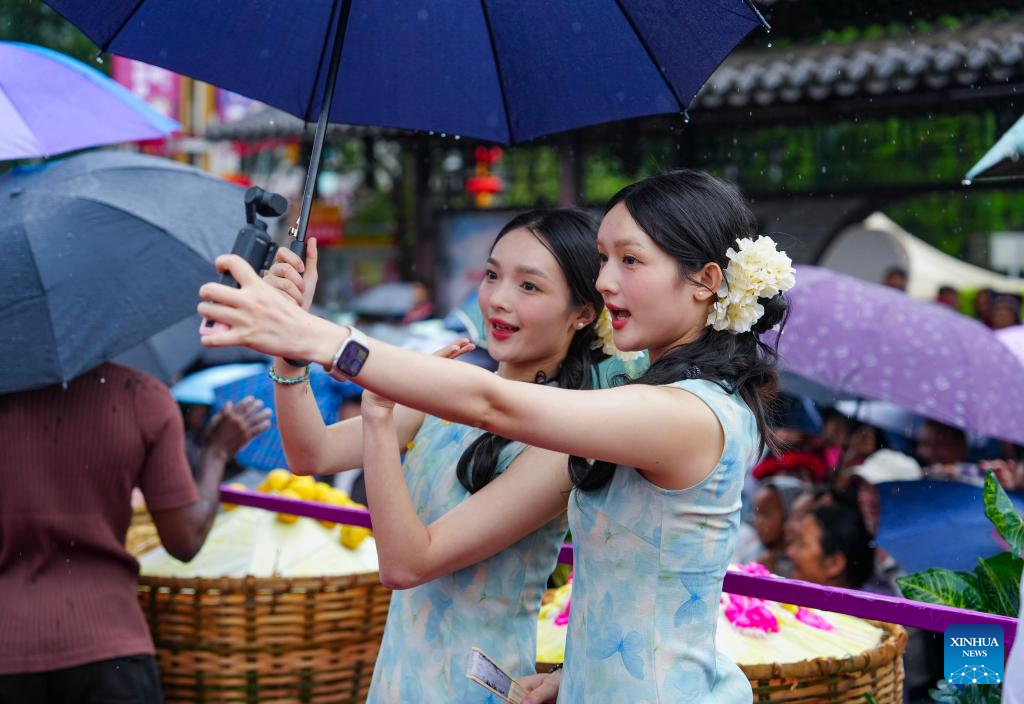 Twin festival lures tourists in SW China's Yunnan