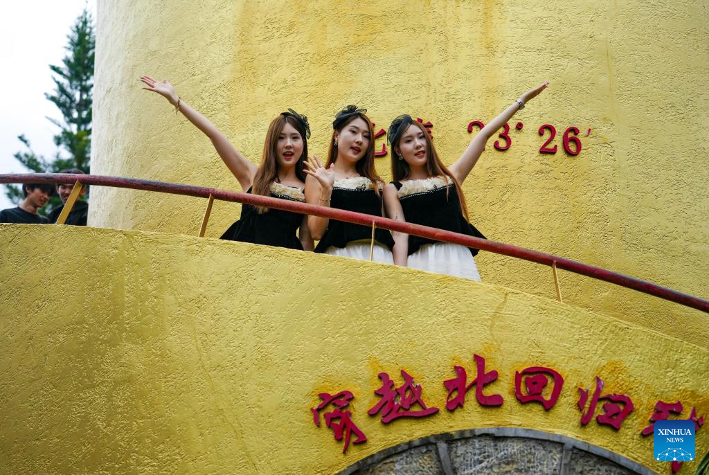 Twin festival lures tourists in SW China's Yunnan