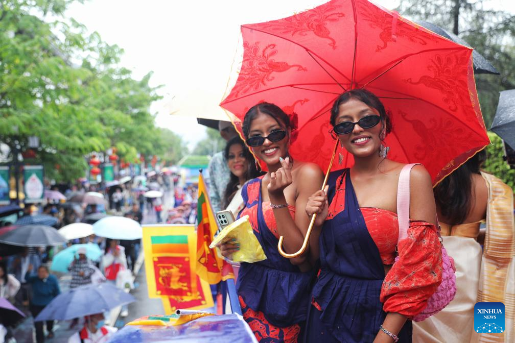 Twin festival lures tourists in SW China's Yunnan