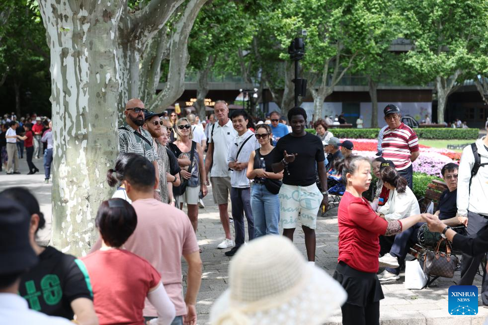 Pic story: inbound tourism planner shows foreign visitors real Shanghai