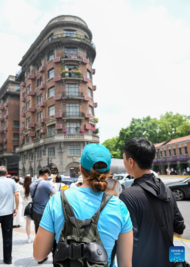 Pic story: inbound tourism planner shows foreign visitors real Shanghai
