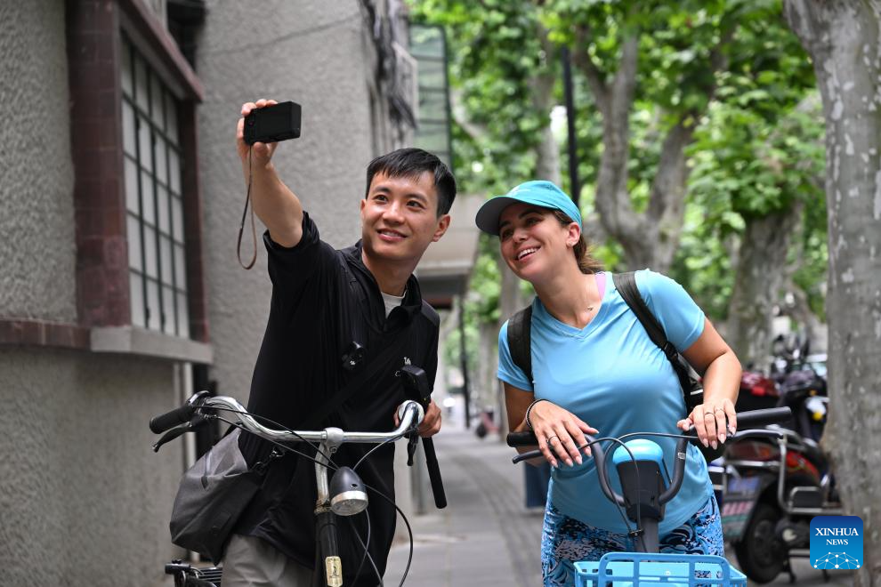 Pic story: inbound tourism planner shows foreign visitors real Shanghai