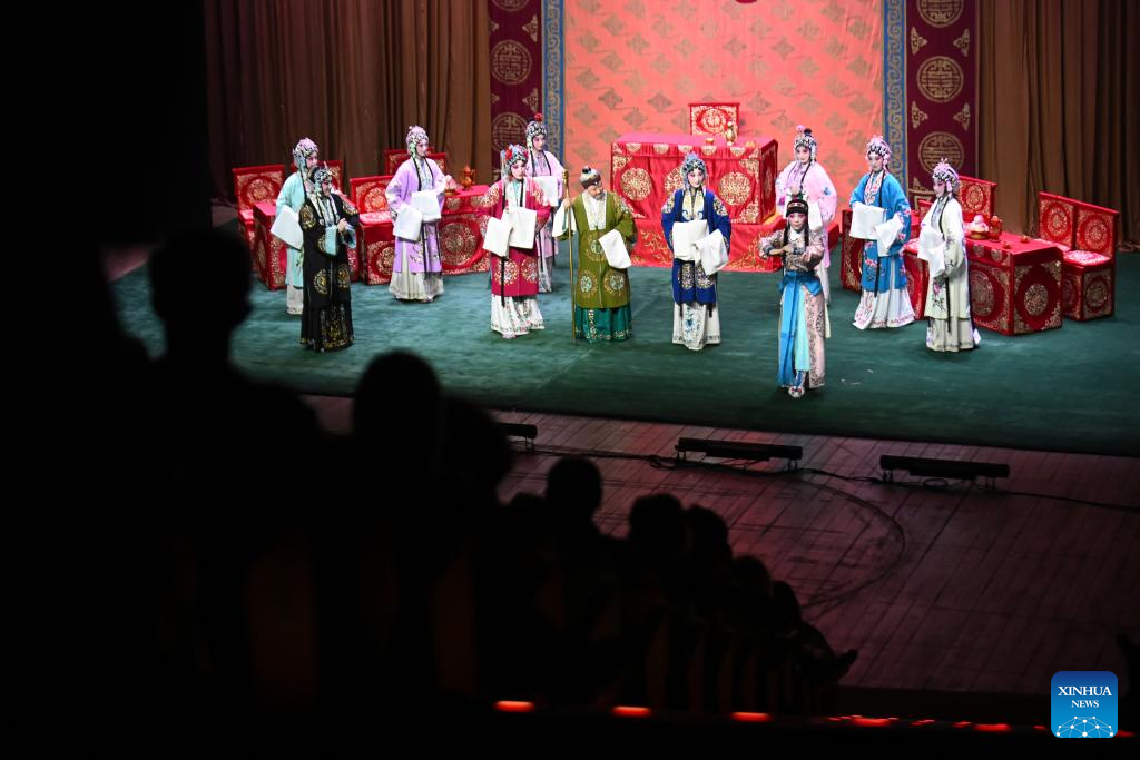 Artists perform Peking opera to mark
