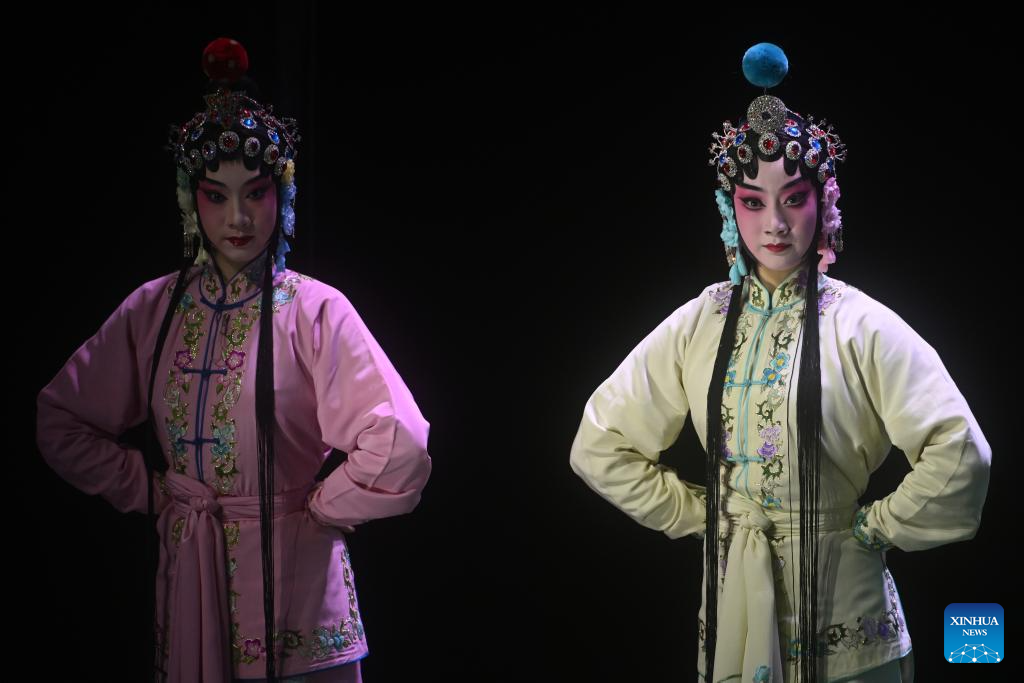 Artists perform Peking opera to mark