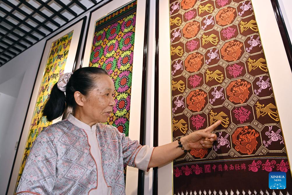 Pic story: inheritor of Zhuang brocade weaving technique in China's Guangxi