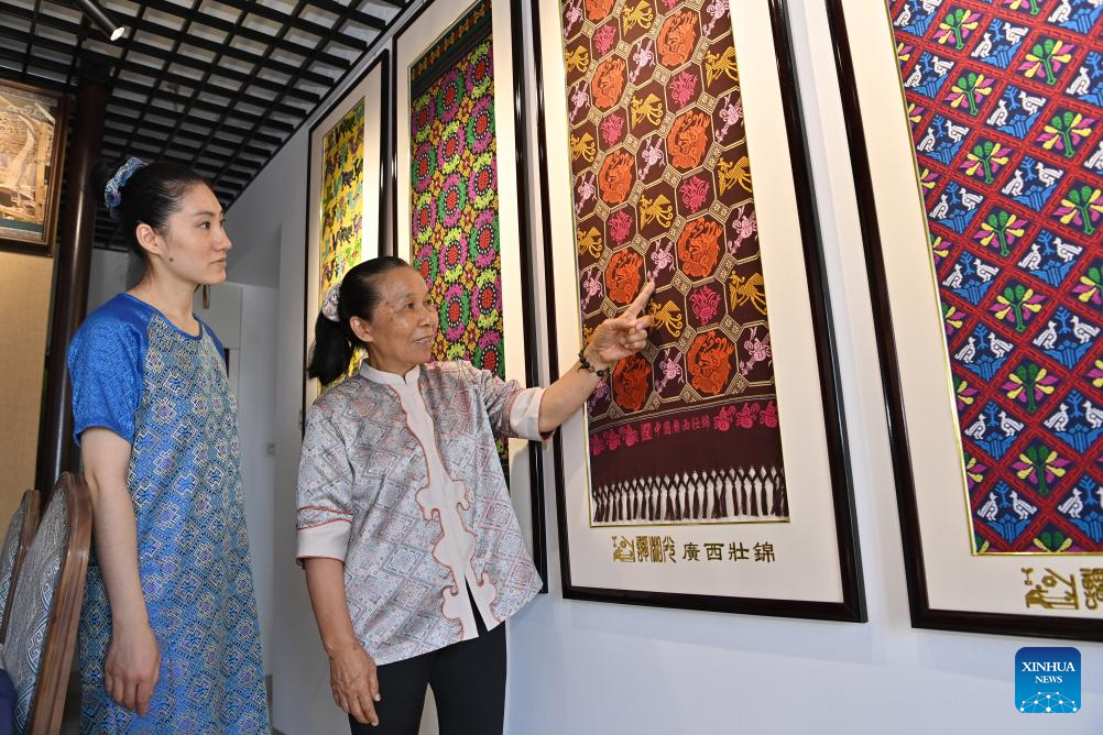 Pic story: inheritor of Zhuang brocade weaving technique in China's Guangxi
