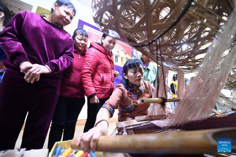 Pic story: inheritor of Zhuang brocade weaving technique in China's Guangxi