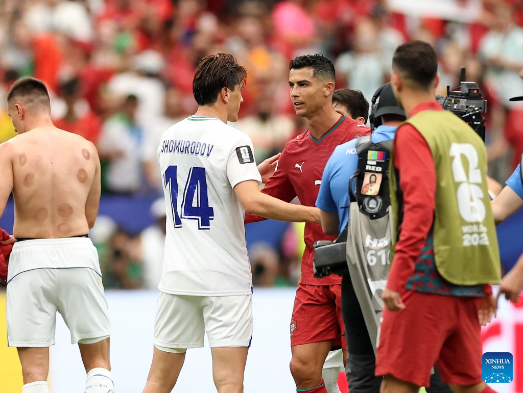 Ronaldo strikes twice as Portugal whitewashes Uzbekistan in Group K