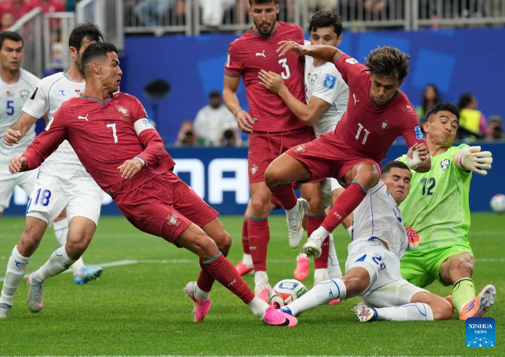 Ronaldo strikes twice as Portugal whitewashes Uzbekistan in Group K