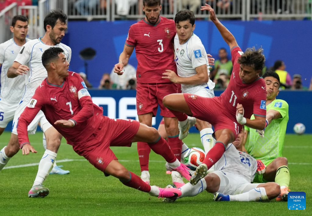 Ronaldo strikes twice as Portugal whitewashes Uzbekistan in Group K