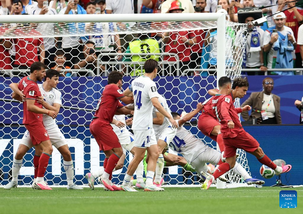 Ronaldo strikes twice as Portugal whitewashes Uzbekistan in Group K