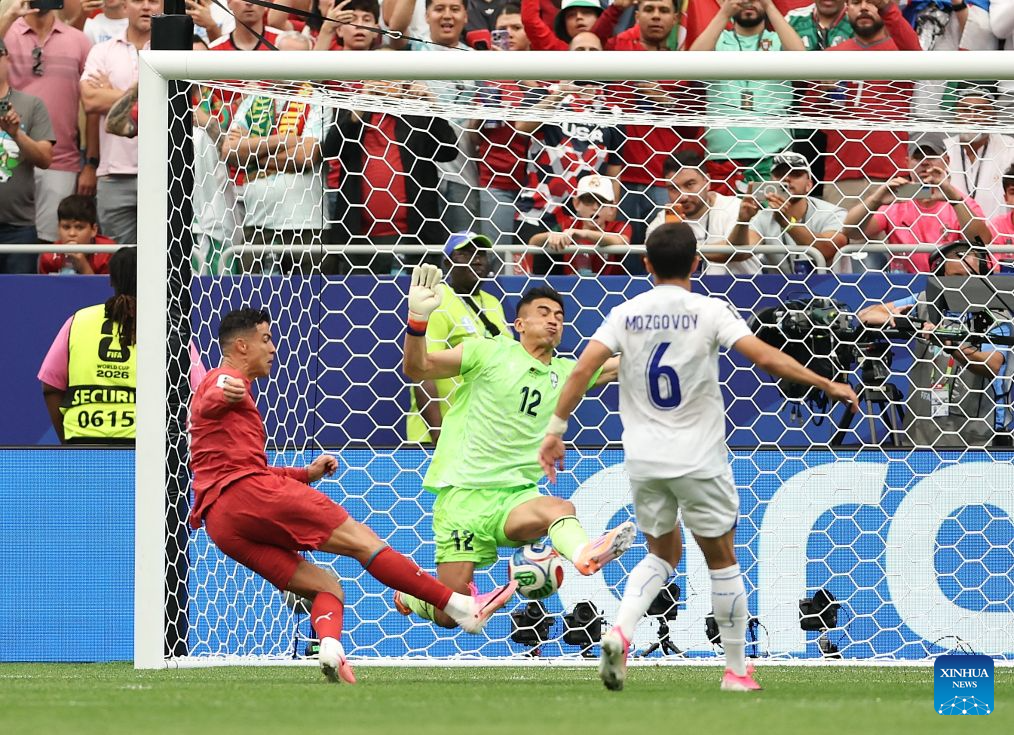 Ronaldo strikes twice as Portugal whitewashes Uzbekistan in Group K