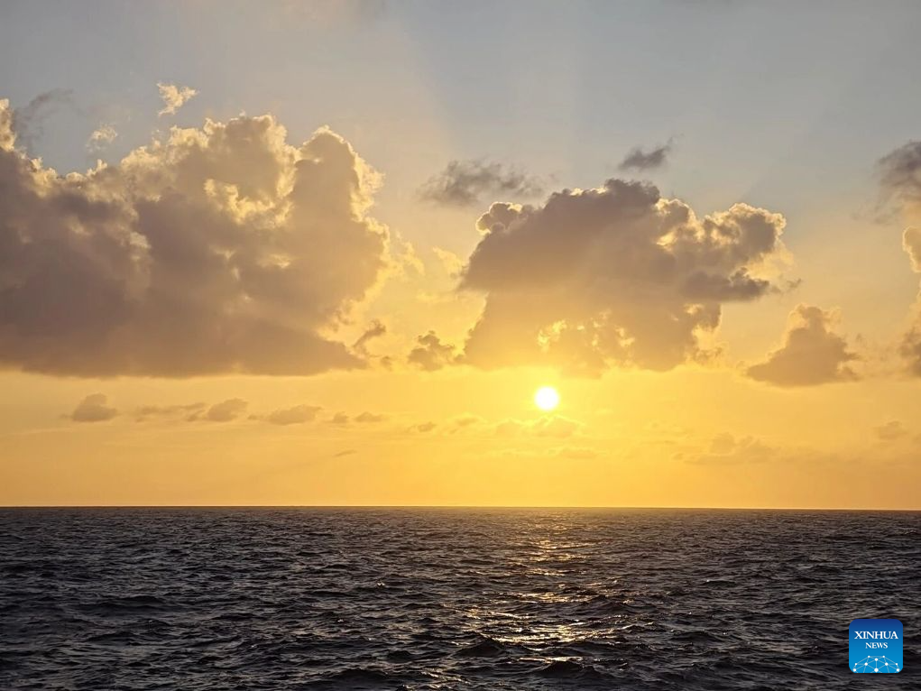 Sunset view over waters surrounding Xisha Islands, S China's Hainan
