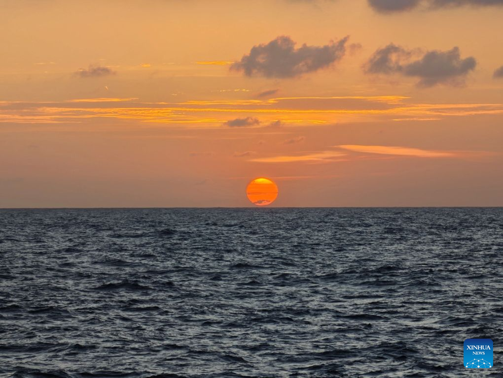 Sunset view over waters surrounding Xisha Islands, S China's Hainan