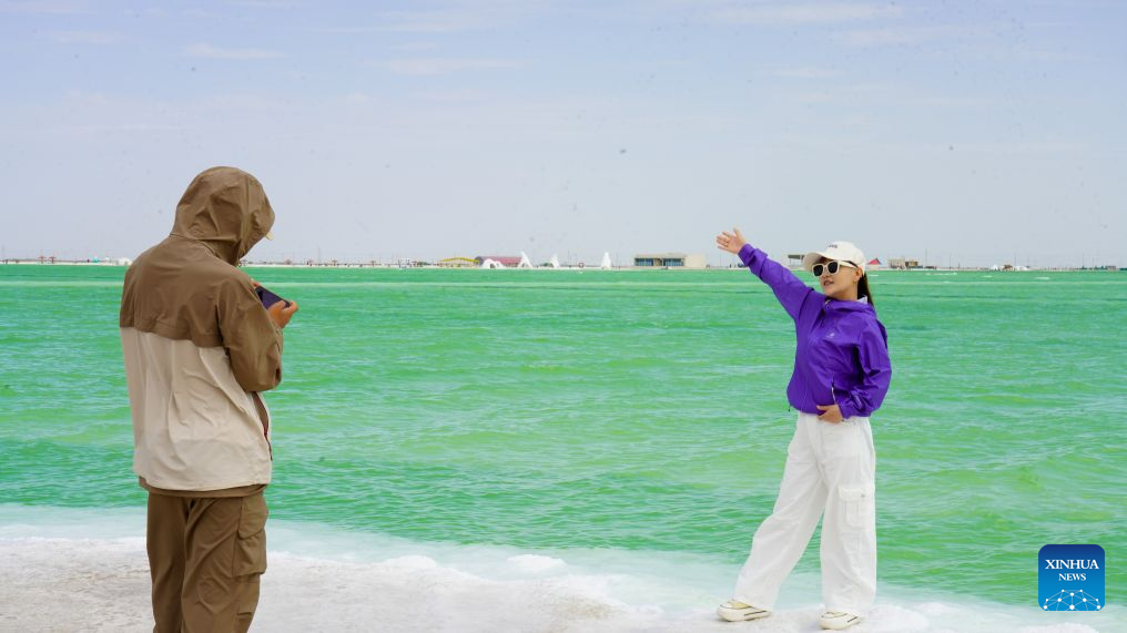 Tourists visit Qairhan salt lake in China's Qinghai