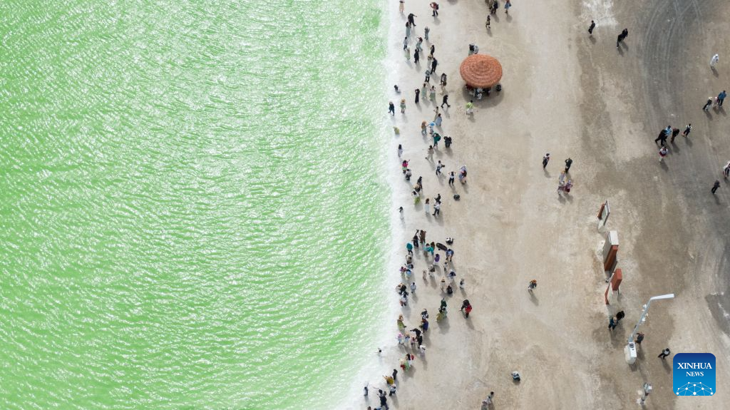 Tourists visit Qairhan salt lake in China's Qinghai
