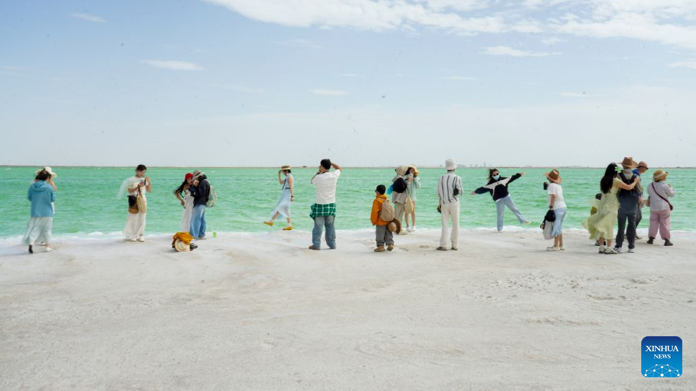 Tourists visit Qairhan salt lake in China's Qinghai