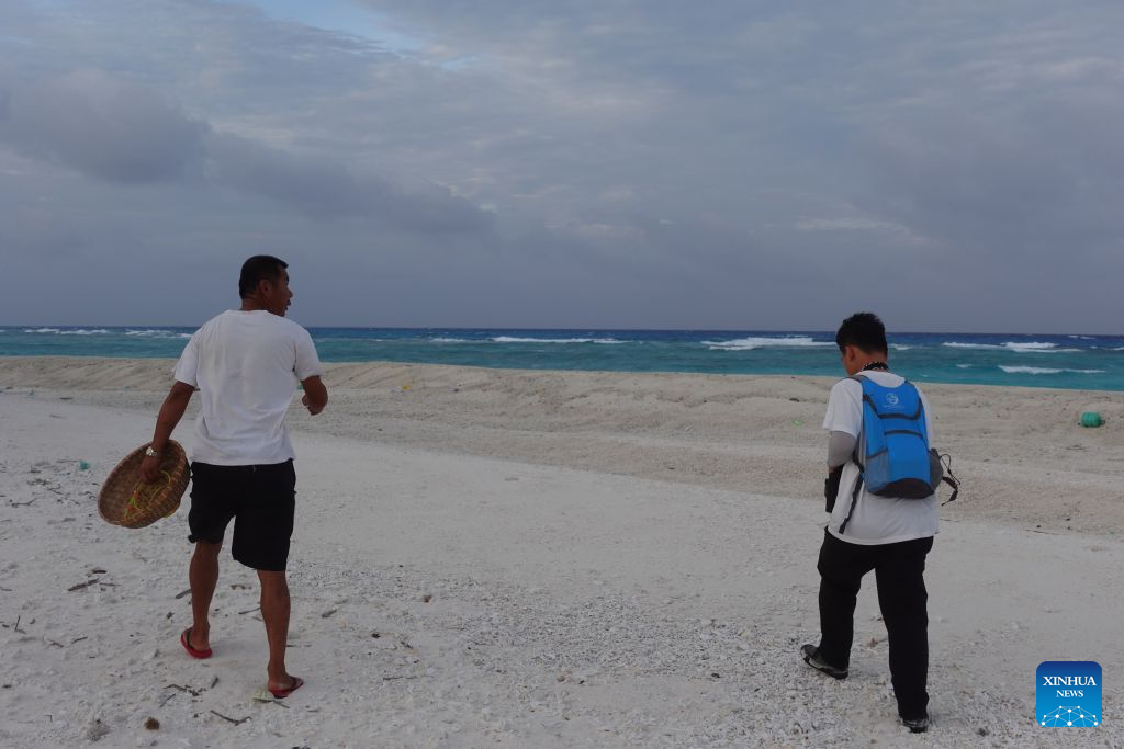 Feature: How researchers, locals safeguard ecological harmony in China's Xisha Islands
