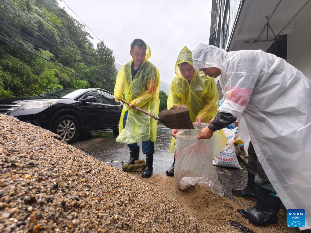 Rescue efforts underway in flood-hit areas across China