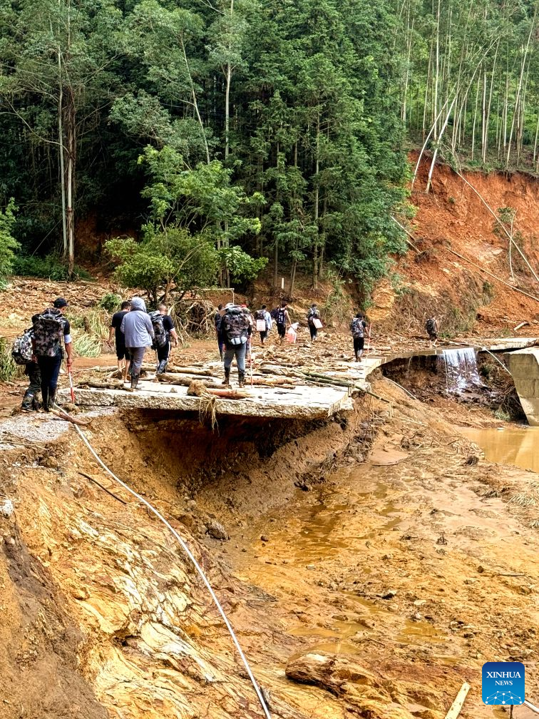 Rescue efforts underway in flood-hit areas across China