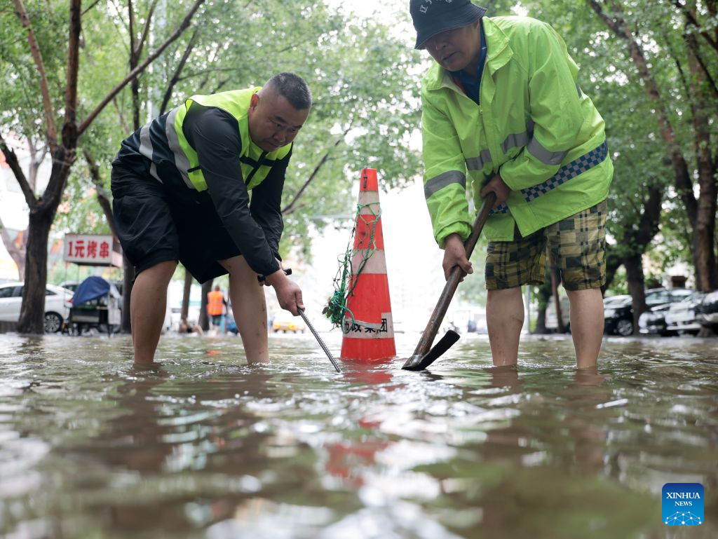 Rescue efforts underway in flood-hit areas across China