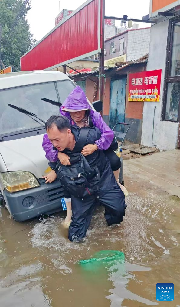 Rescue efforts underway in flood-hit areas across China