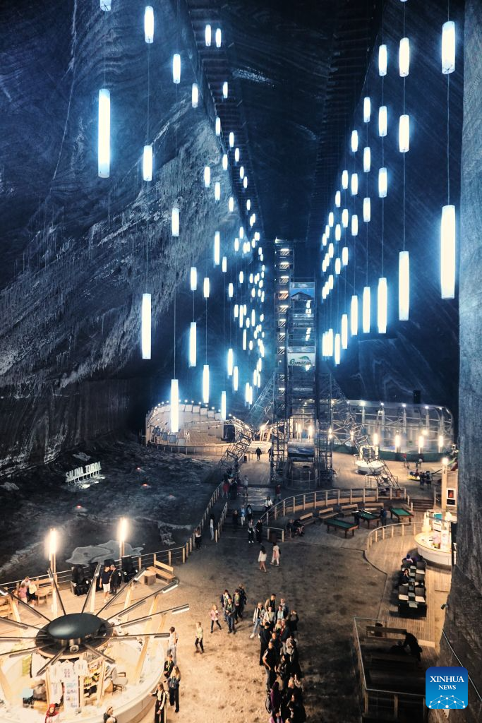 Disused salt mine in Turda offers cool retreat amid European heat wave