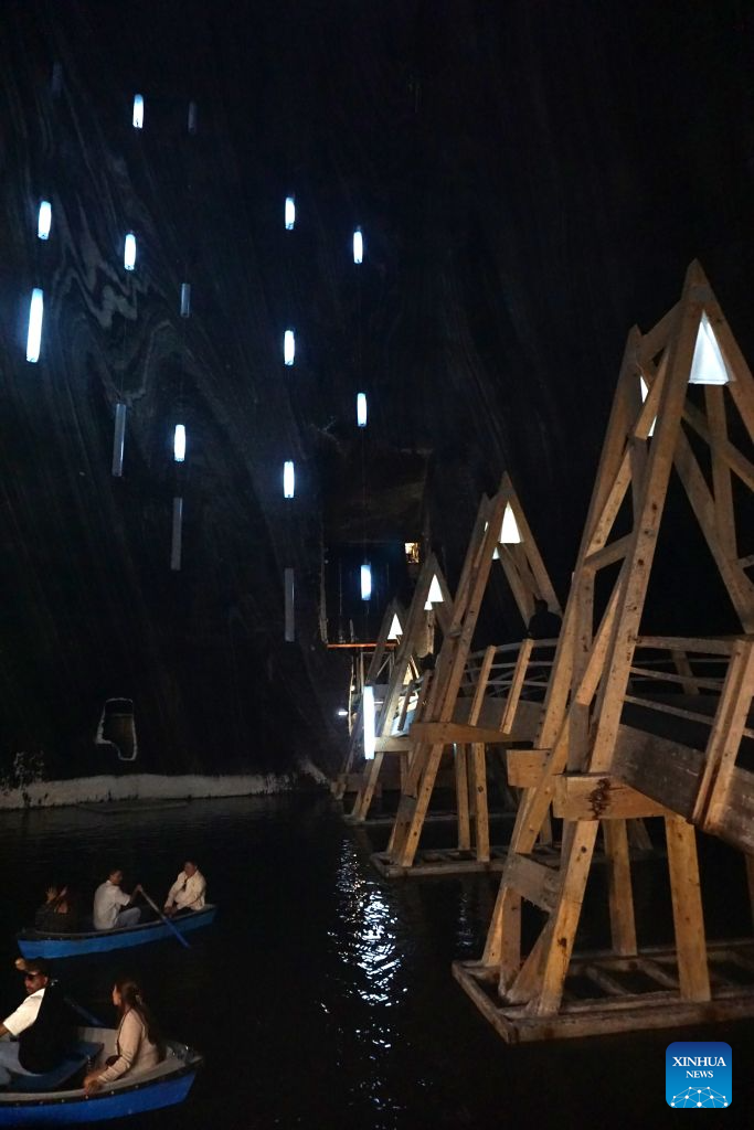 Disused salt mine in Turda offers cool retreat amid European heat wave