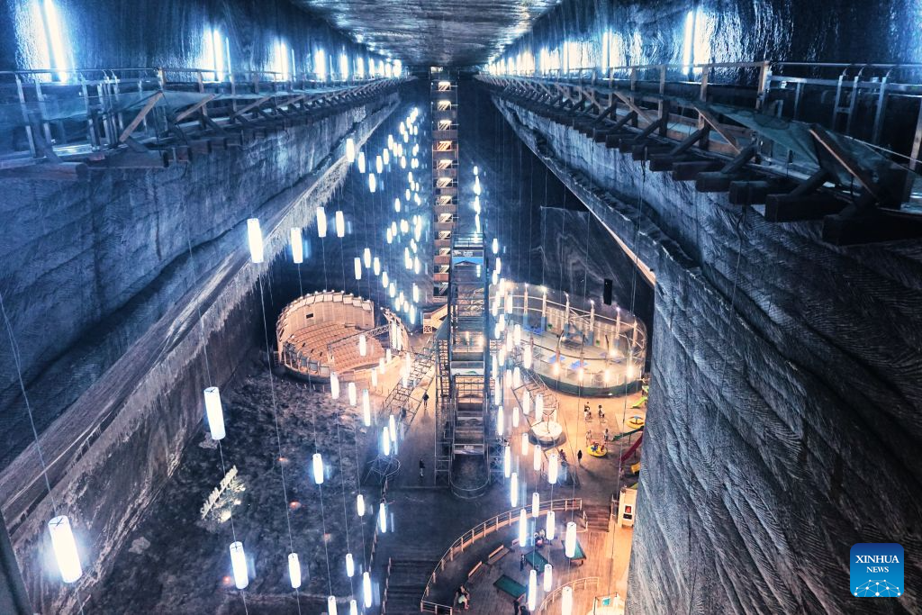 Disused salt mine in Turda offers cool retreat amid European heat wave