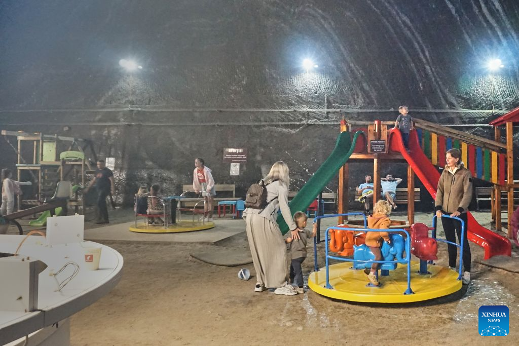 Disused salt mine in Turda offers cool retreat amid European heat wave